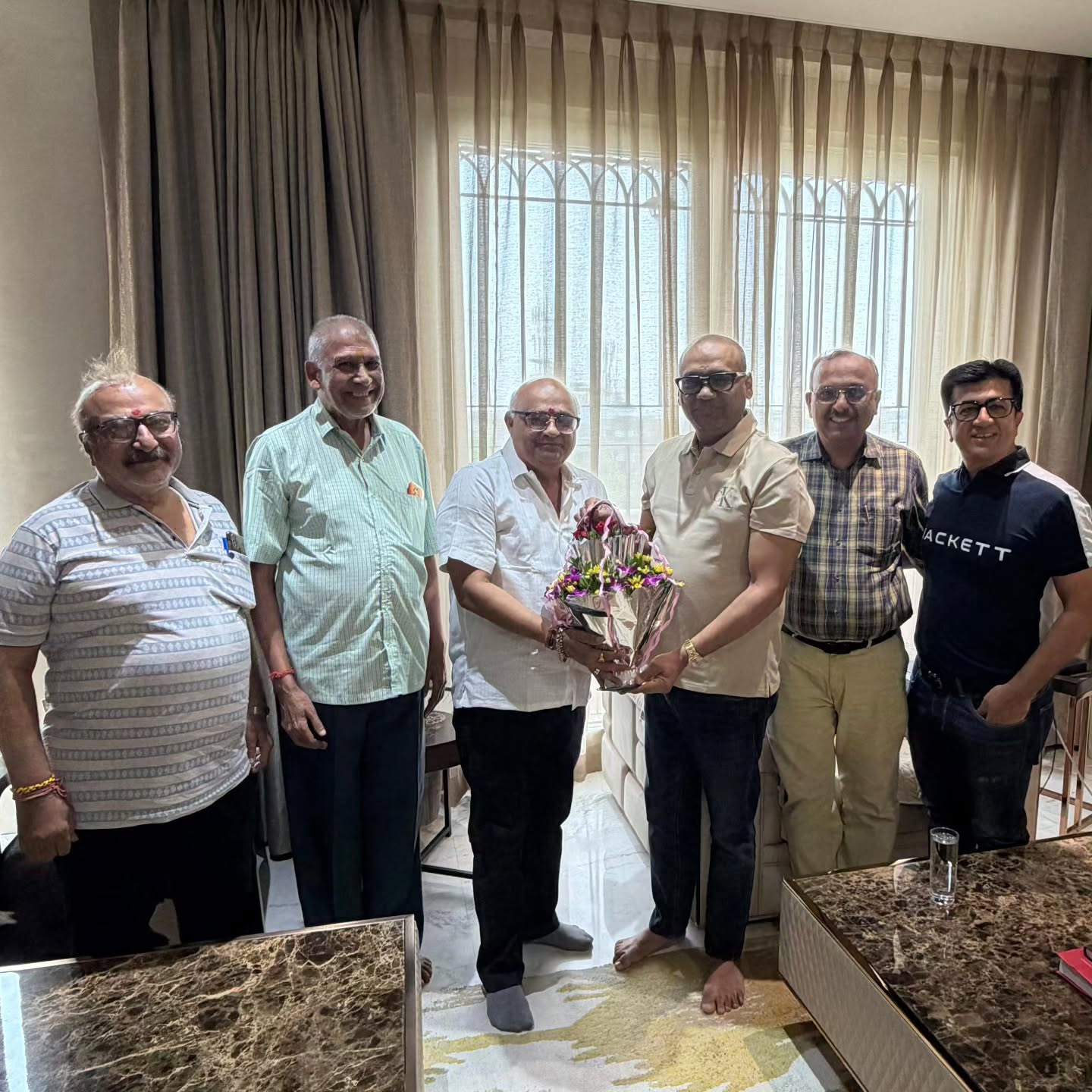 Dr. Ravi Agrawal, President of O J Agrawal Charitable Trust, with trustee Shri Hemang Tanna and office bearers of Navratra Davakhana, Nagpur, May 2026