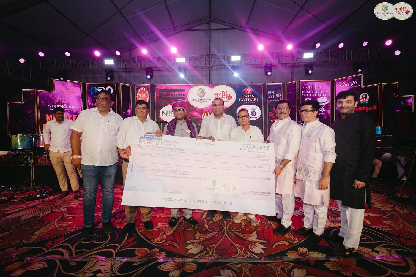 A contribution to Shri Krishna Gaushala Sanstha for cow welfare at Surbhi, the Navratri hosted by Dr. Ravi Agrawal's family at Chattarpur Farms, with O J Agrawal Charitable Trust taking part in the handover