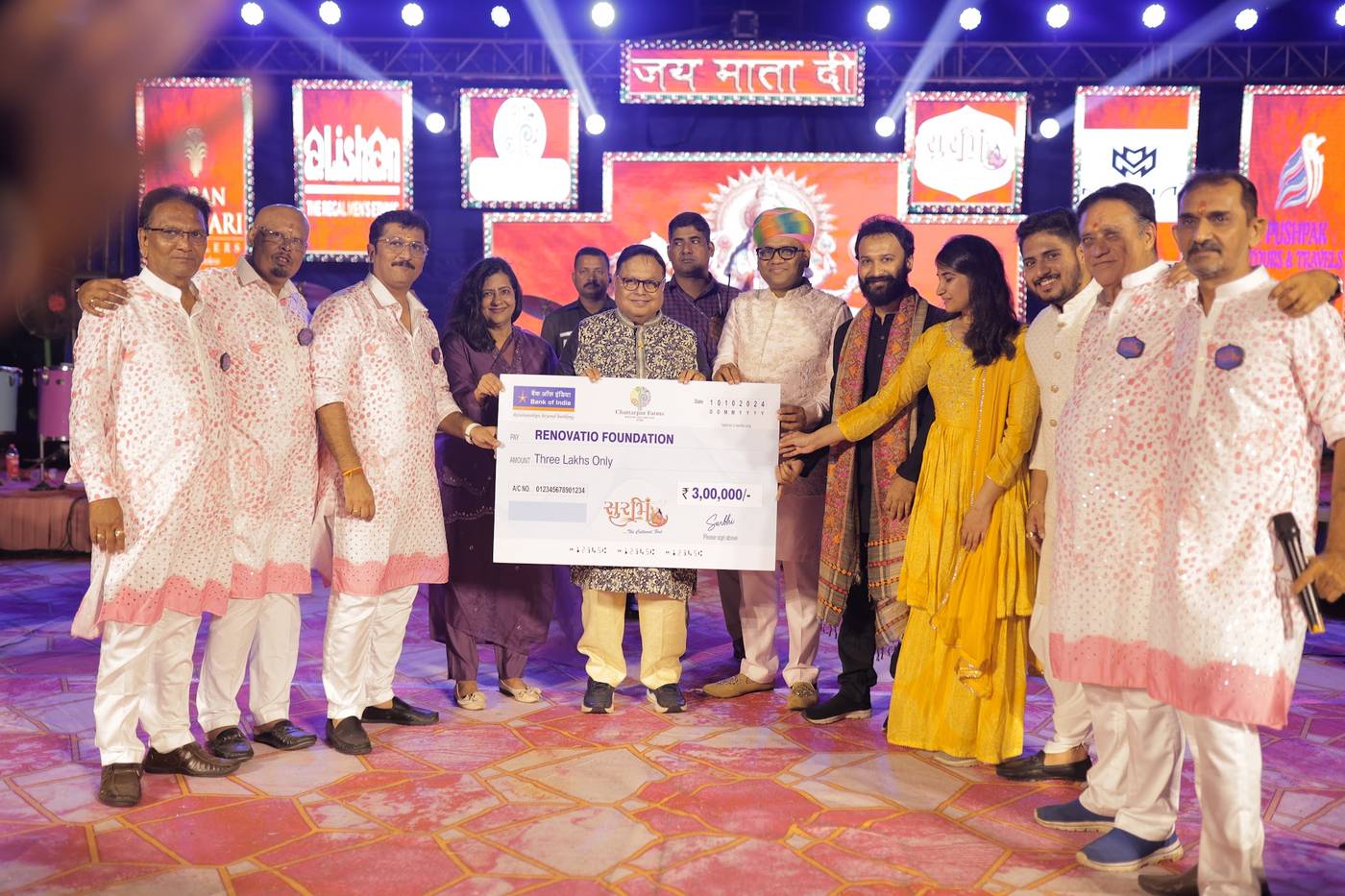 A contribution to Renovatio Foundation at Surbhi, the Navratri hosted by Dr. Ravi Agrawal's family at Chattarpur Farms, with O J Agrawal Charitable Trust taking part in the handover
